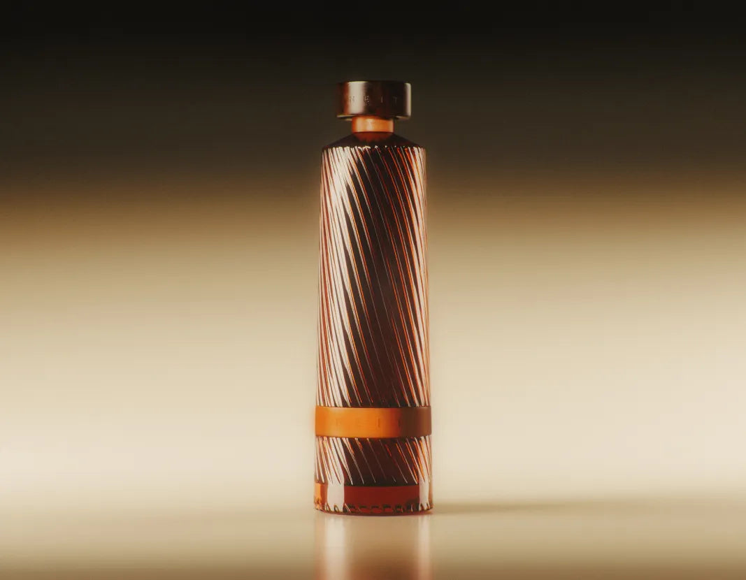 Decorative glass bottle with a textured design on a beige background